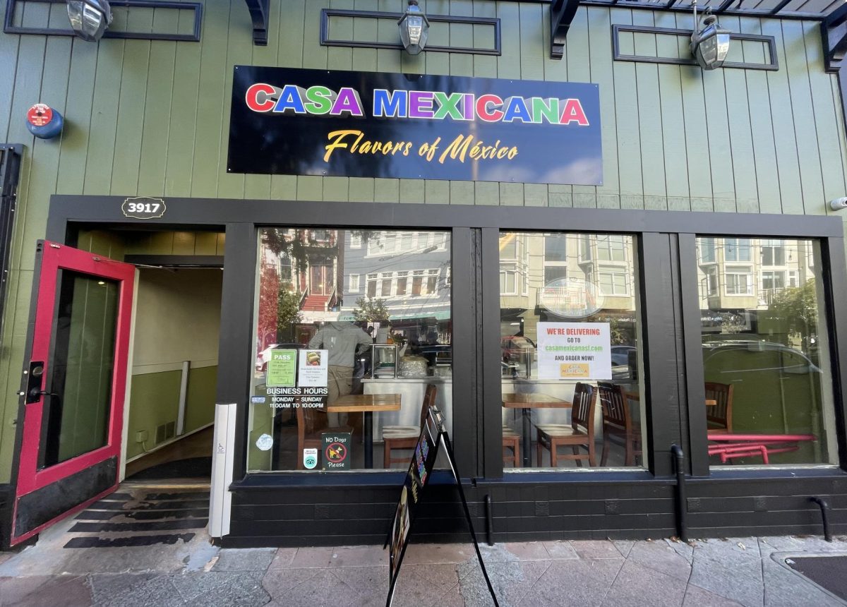 Business hours and delivery intructions are posted at the front.
