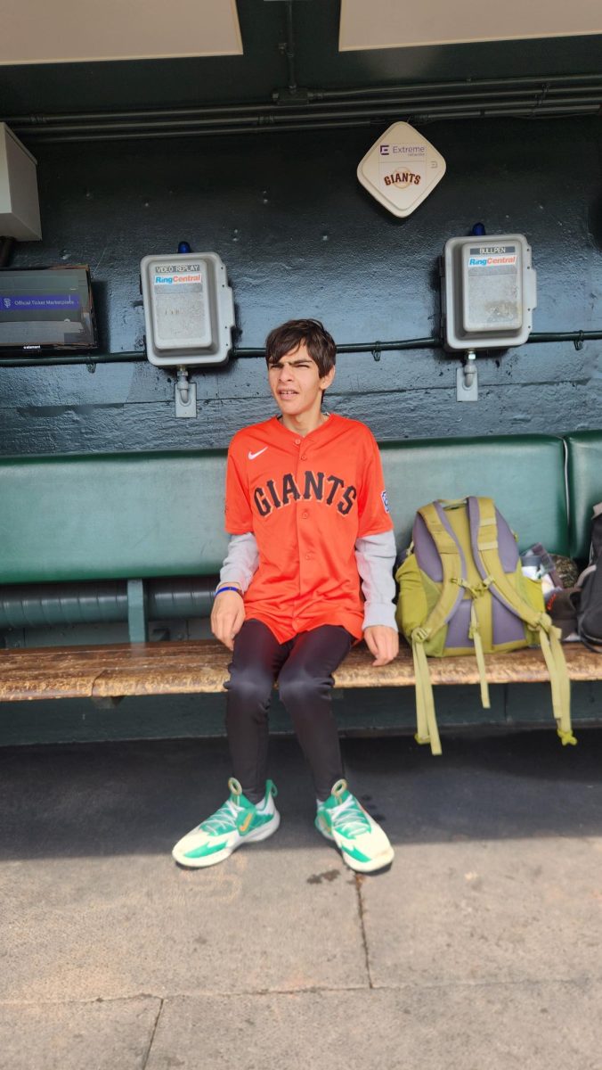 Staff writer Emilio in the SF Giants dugout.