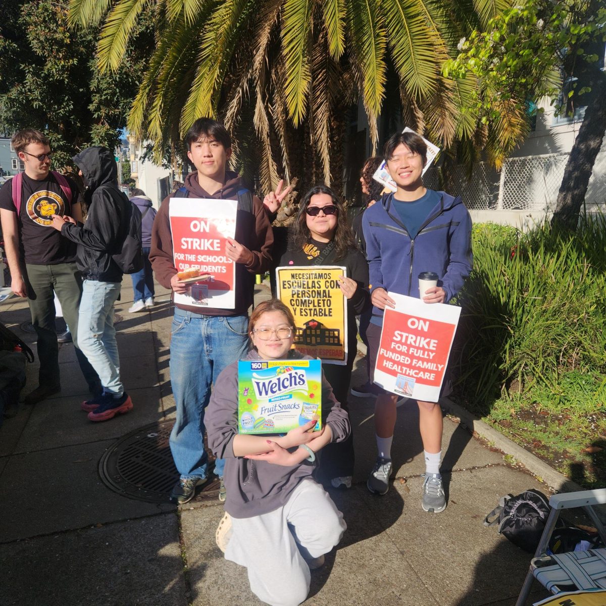Ms. Asterlee, center, with students during the strike.