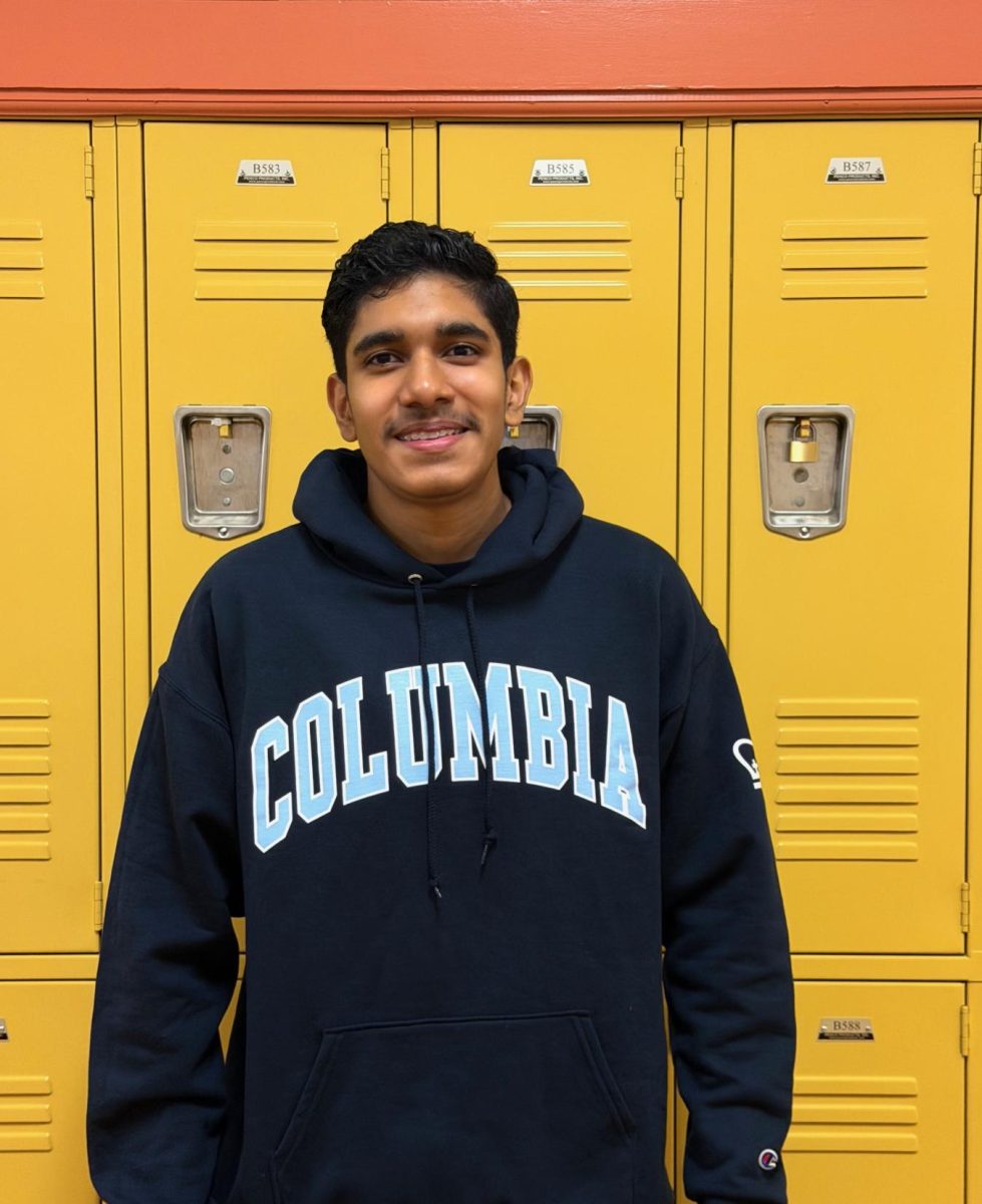 Jason Singh in front of MHS lockers. 