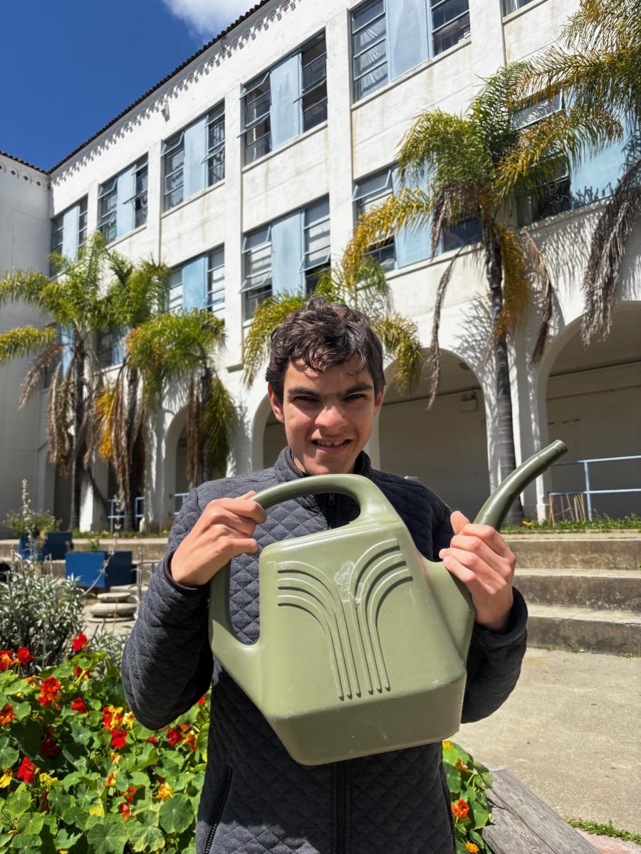 Staff Writer, Emilio, in the MHS gardens.